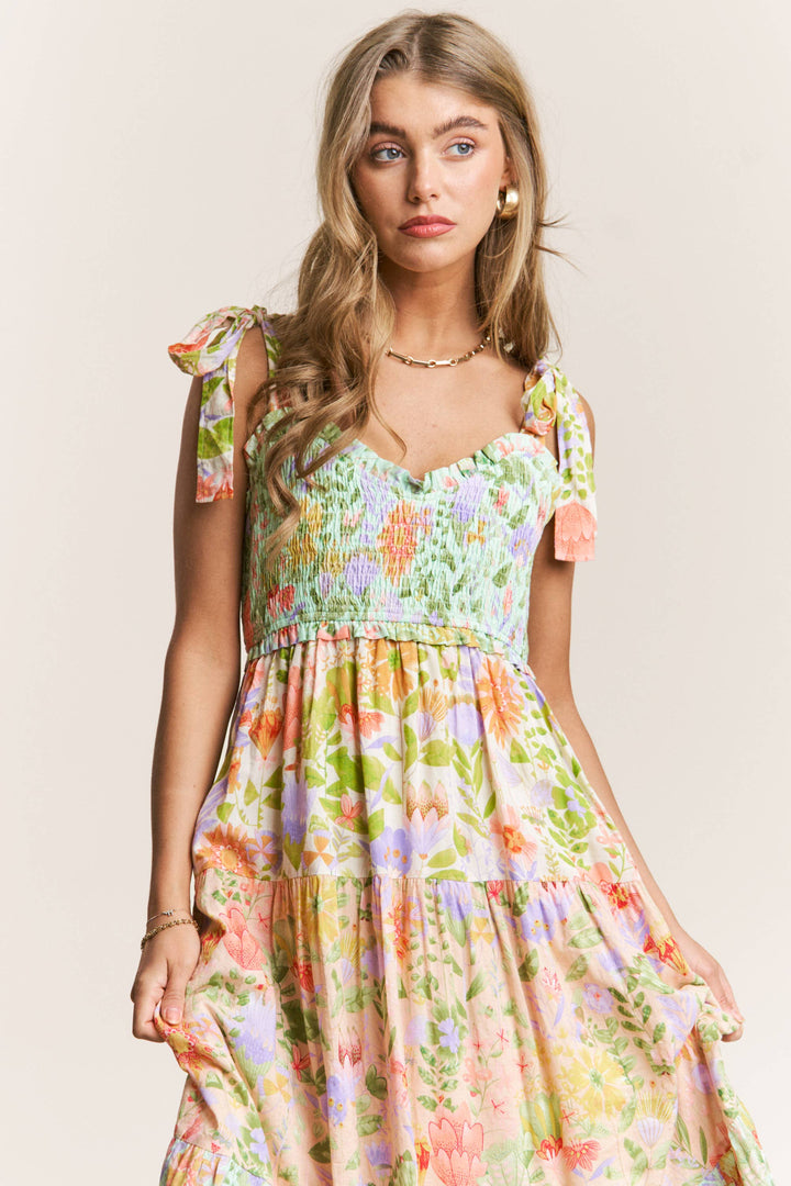 details front Garden Dream Tiered Multi Print Maxi Dress — floral print, smocked bodice, tie shoulders, true-to-size fit by Onyx Native