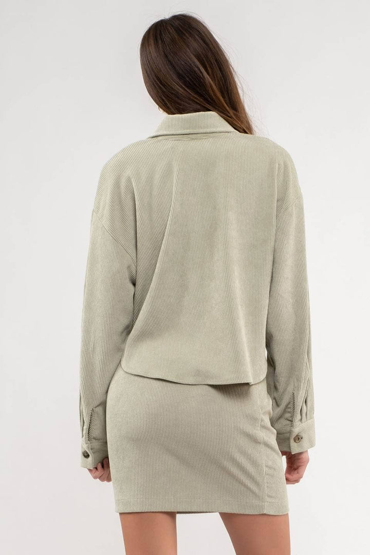 back view of Dusty Sage Button Up Rib Knit Jacket with Collar, Long Sleeves, Pockets, and Pocket Slits.
