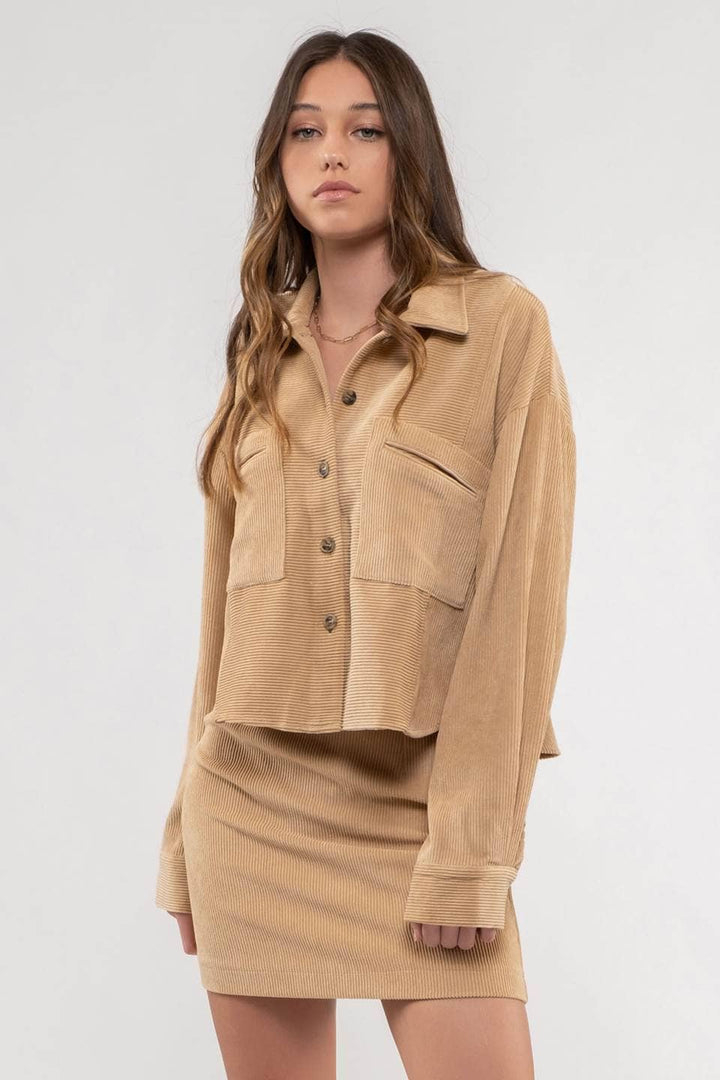 view of model in yellow color Dusty Sage Button Up Rib Knit Jacket with Collar, Long Sleeves, Pockets, and Pocket Slits.