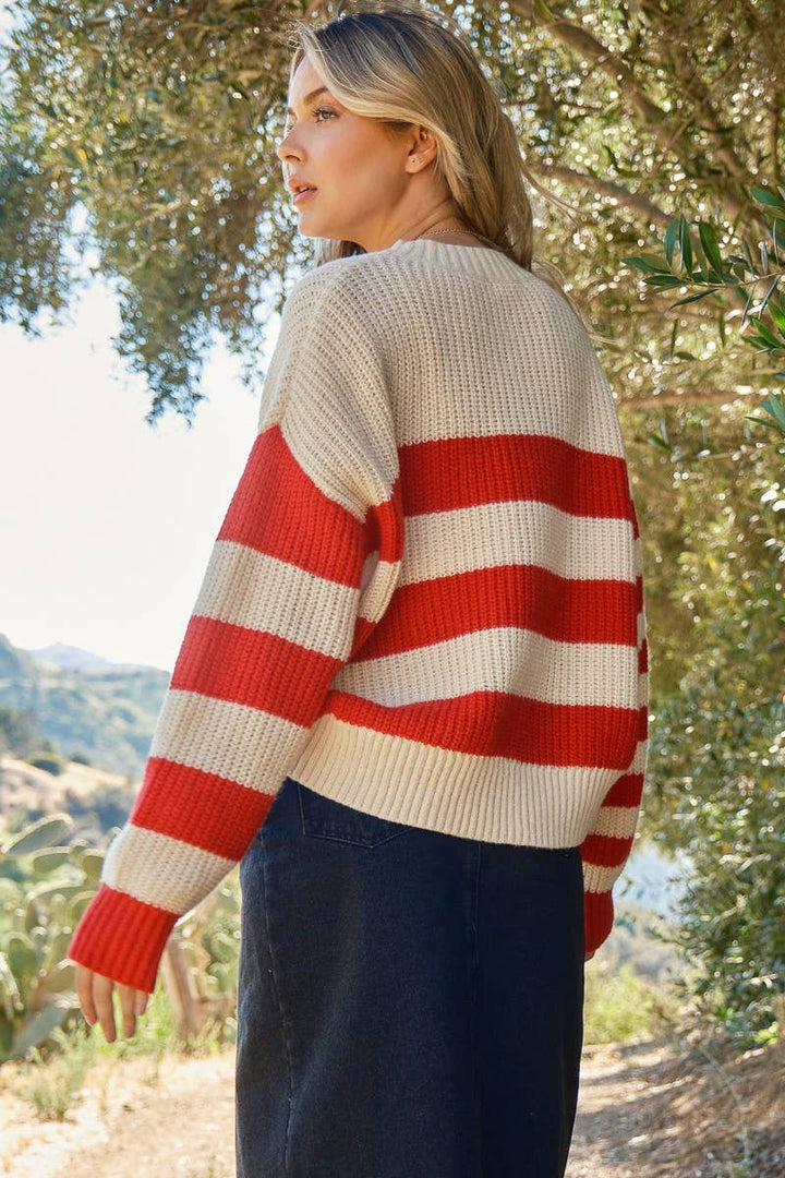 back view of Molly Oversized Stripe Knit Sweater with pocket, featuring a relaxed fit, available at Onyx Native.