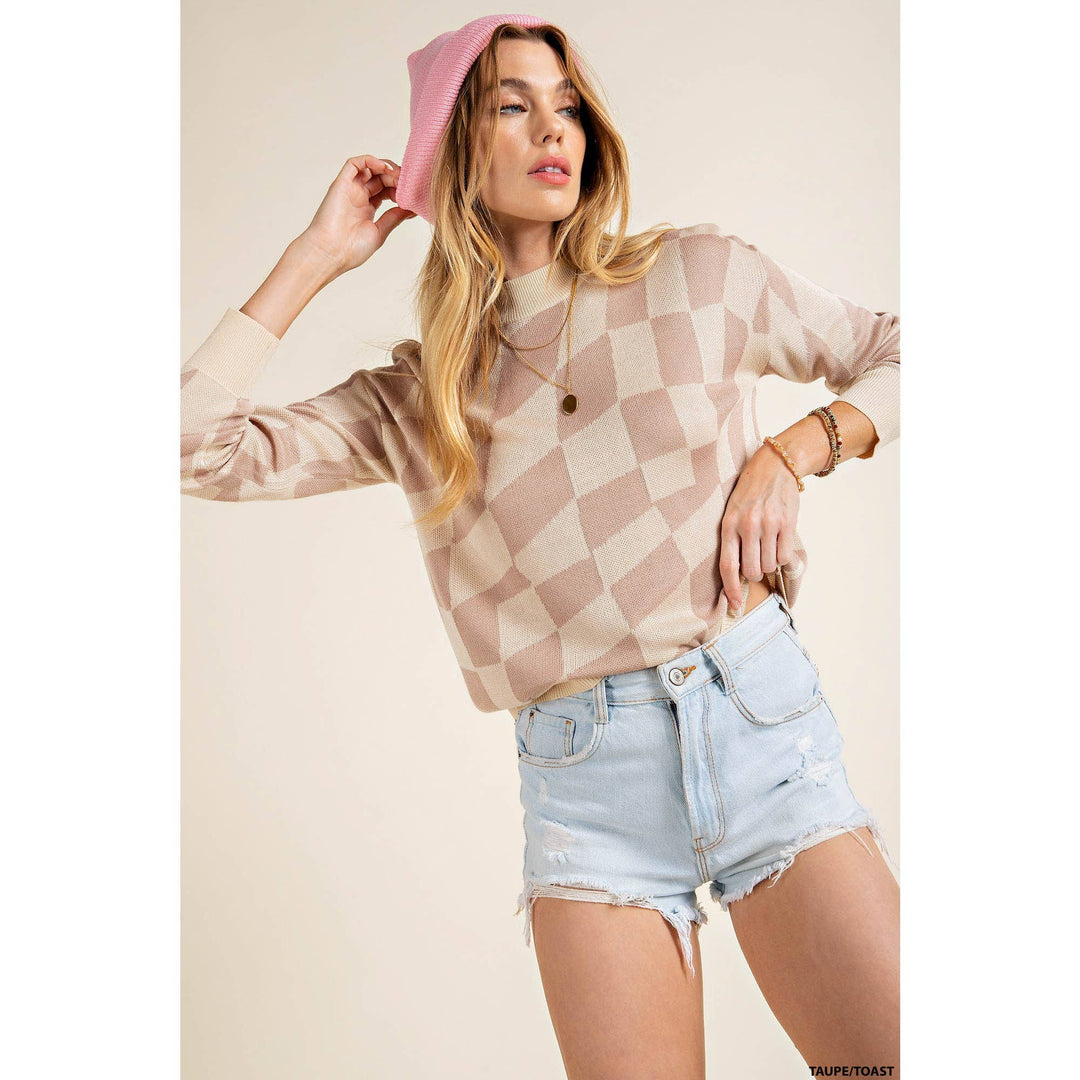 slight side view of Checker print lightweight mock neck knit top featuring soft thread checker knitting and long sleeves.