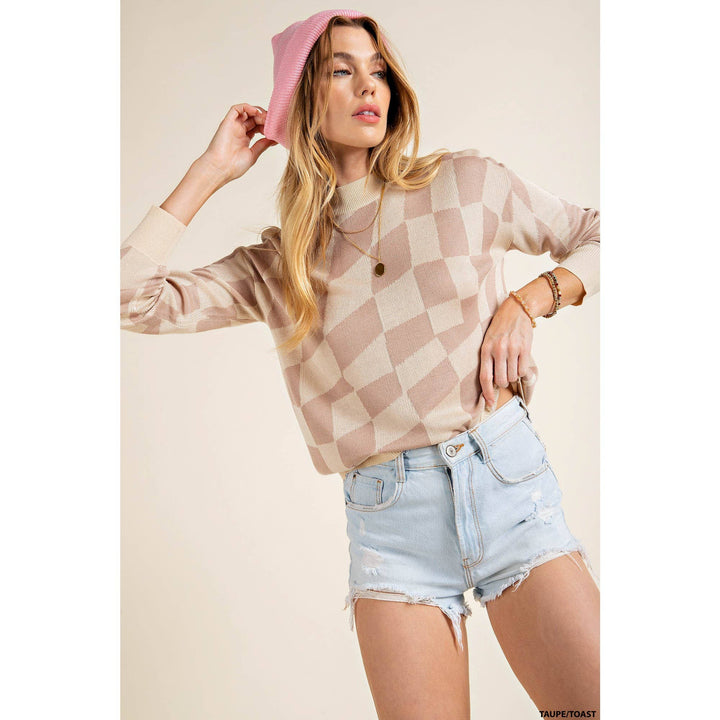 slight side view of Checker print lightweight mock neck knit top featuring soft thread checker knitting and long sleeves.