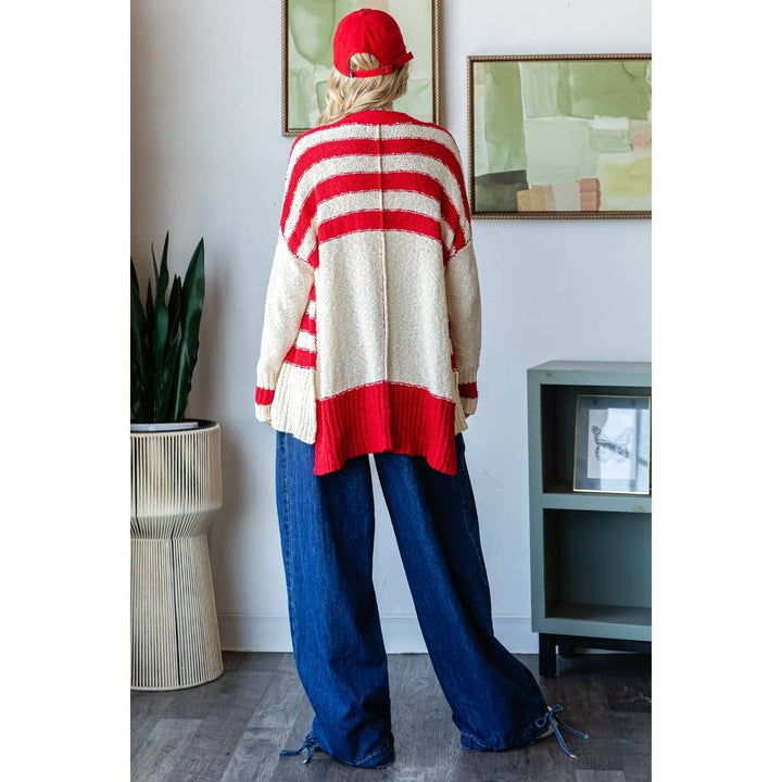 zoomed out back view of Sally Stripe Mix Oversize Cardigan with 3-button front, solid stripe accents, and side slit design, available at Onyx Native.