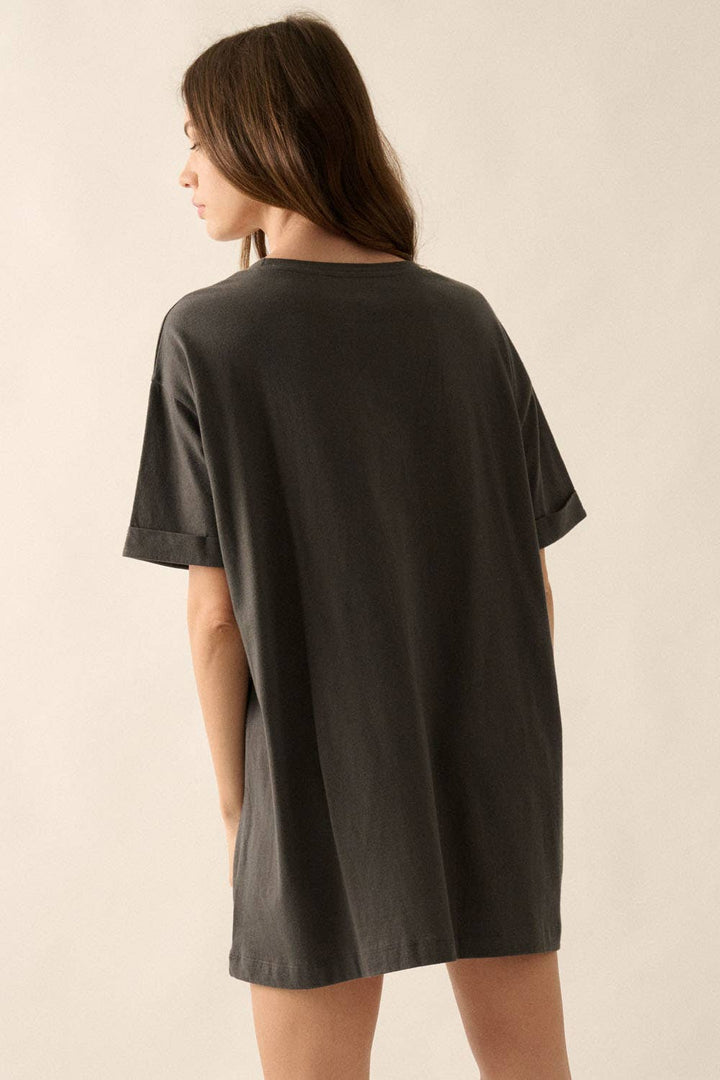 back view of Ya'll Cowboy Boots Vintage Wash Graphic Tee with 'Ya'll' text, stars, and cowboy boots graphics. Oversized fit, mineral washed, round neckline, short cuffed sleeves, and dropped shoulders