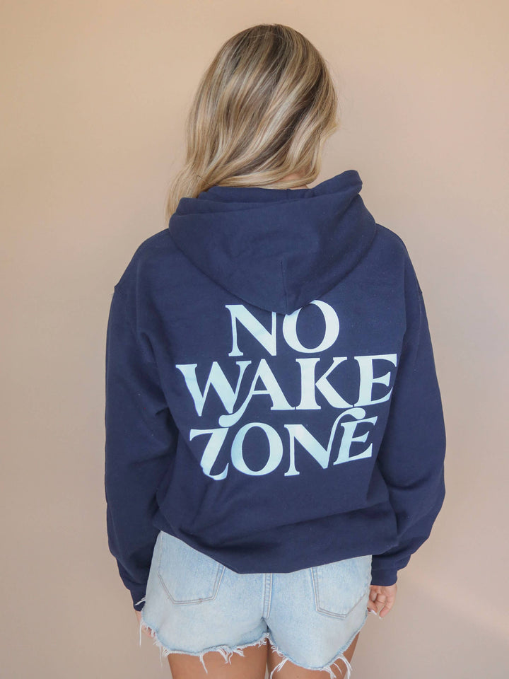 back view wording NO WAKE ZONE Hoodie — lake-inspired true-to-size hoodie with front and back graphics, Jo Johnson Overby collaboration by Onyx Native
