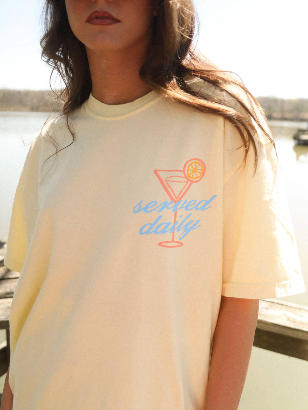 close up Docktails Tee — butter yellow Comfort Colors® with orange and blue lake-themed front and back graphics, summer-ready by Onyx Native