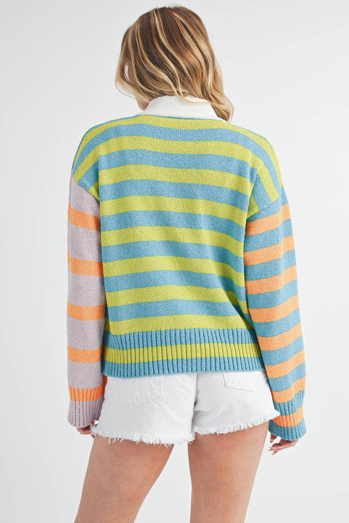 back view of Flavia Sweater featuring mixed stripes, drop-shoulder design, cashmere-blend fabric, deep V-neck, and front button closure.
