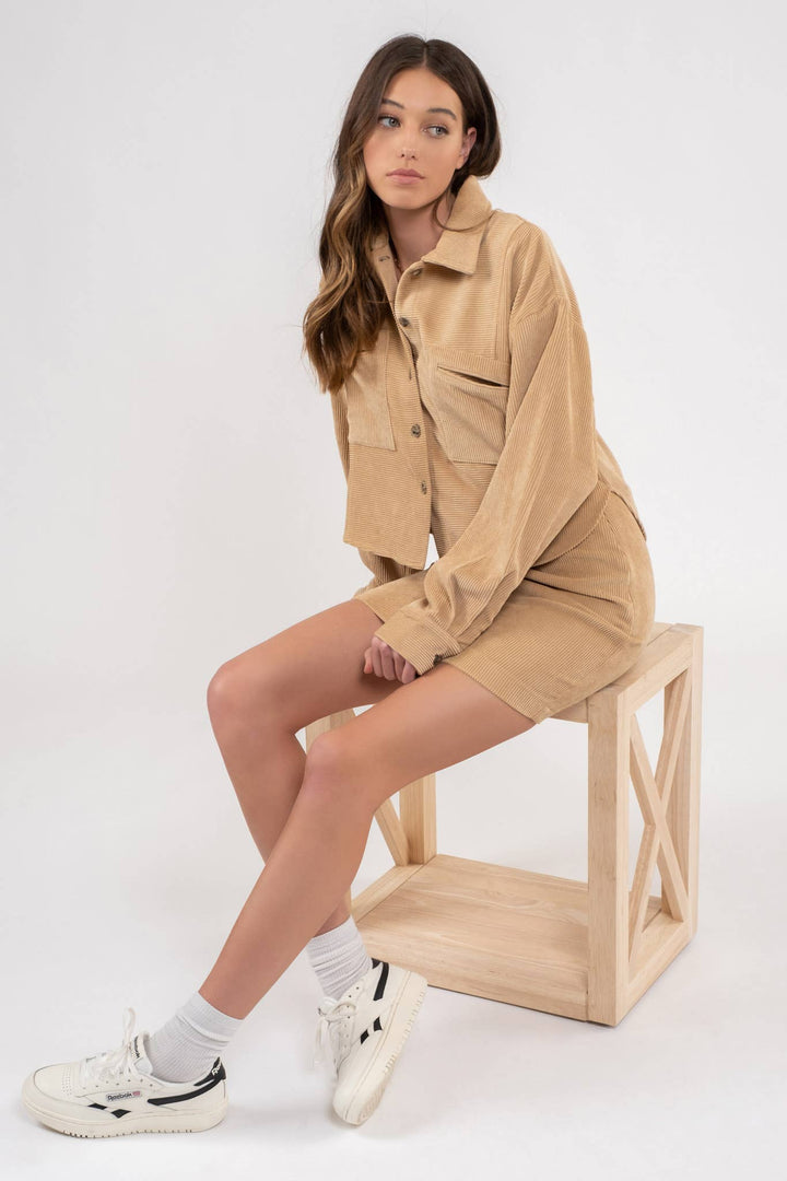 model view of yellow color Dusty Sage Button Up Rib Knit Jacket with Collar, Long Sleeves, Pockets, and Pocket Slits.