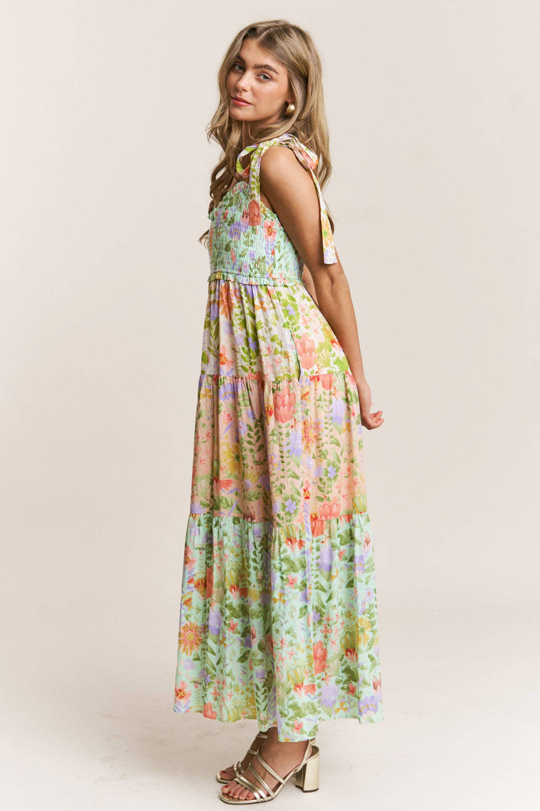 side view Garden Dream Tiered Multi Print Maxi Dress — floral print, smocked bodice, tie shoulders, true-to-size fit by Onyx Native