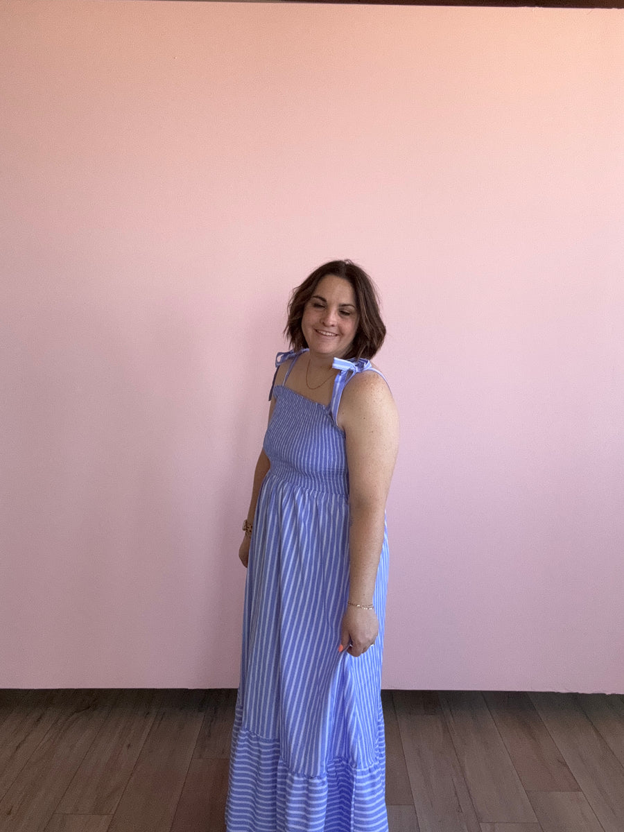 Wendy Tie Dress — blue striped maxi dress with playful bow tie detail, standout quirky style by Onyx Native