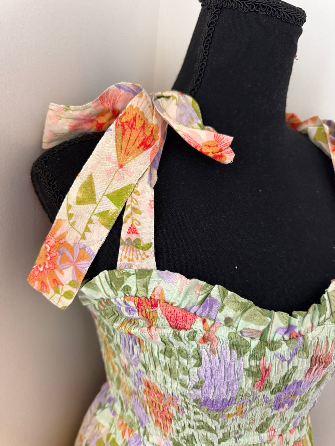 shoulder bow Garden Dream Tiered Multi Print Maxi Dress — floral print, smocked bodice, tie shoulders, true-to-size fit by Onyx Native
