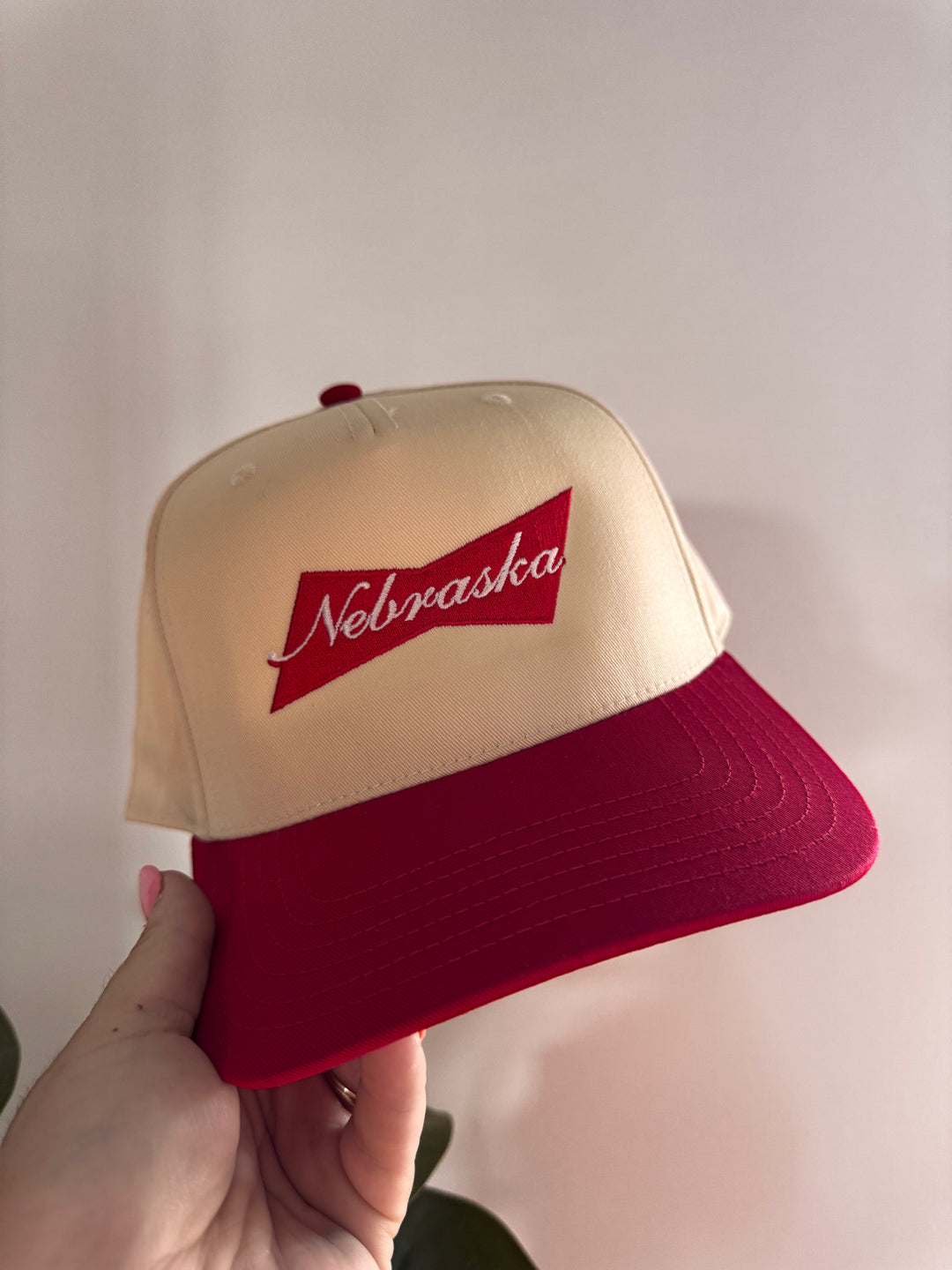 Nebraska Budweiser Trucker Hat — adjustable trucker cap with iconic Budweiser logo, perfect for beer lovers and collectors by Onyx Native
