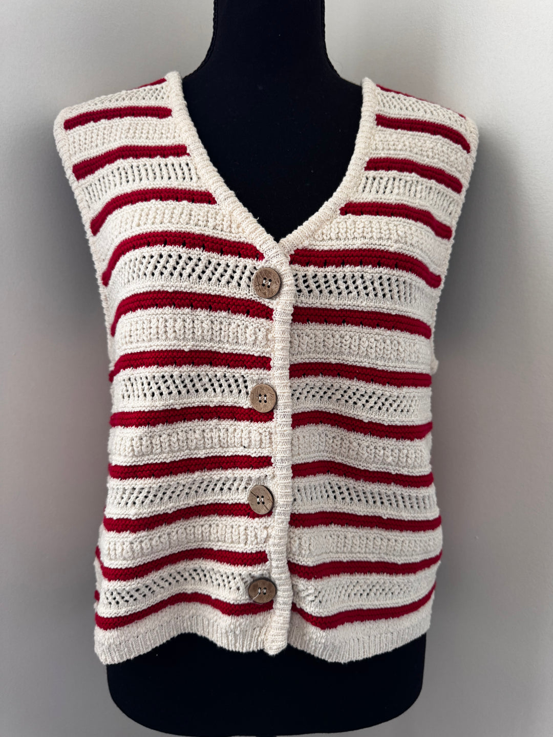 Old Red Stripe Sweater Vest — lightweight knit vest with classic button detail and playful red stripes, perfect for layering by Onyx Native