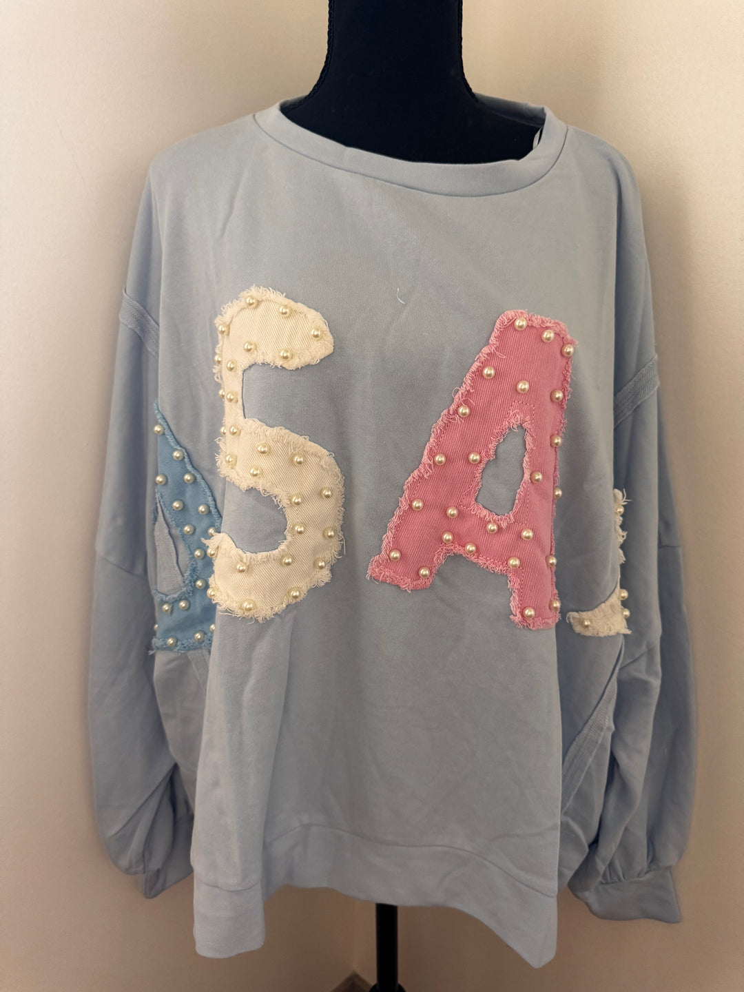 USA Blue Pearl Sweater — oversized cotton sweater with stitched details, pastel shades, and pearl accents by Onyx Native
