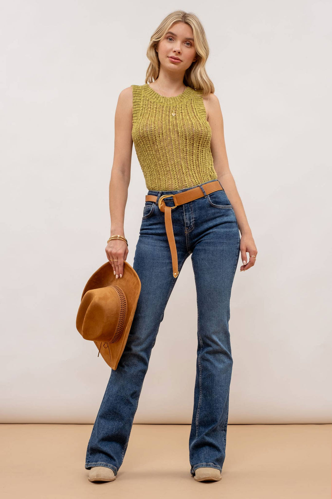 zoomed out view of Kiwi Crochet Sweater Knit Tank Top with a round neckline and sleeveless design, made from 100% polyester.