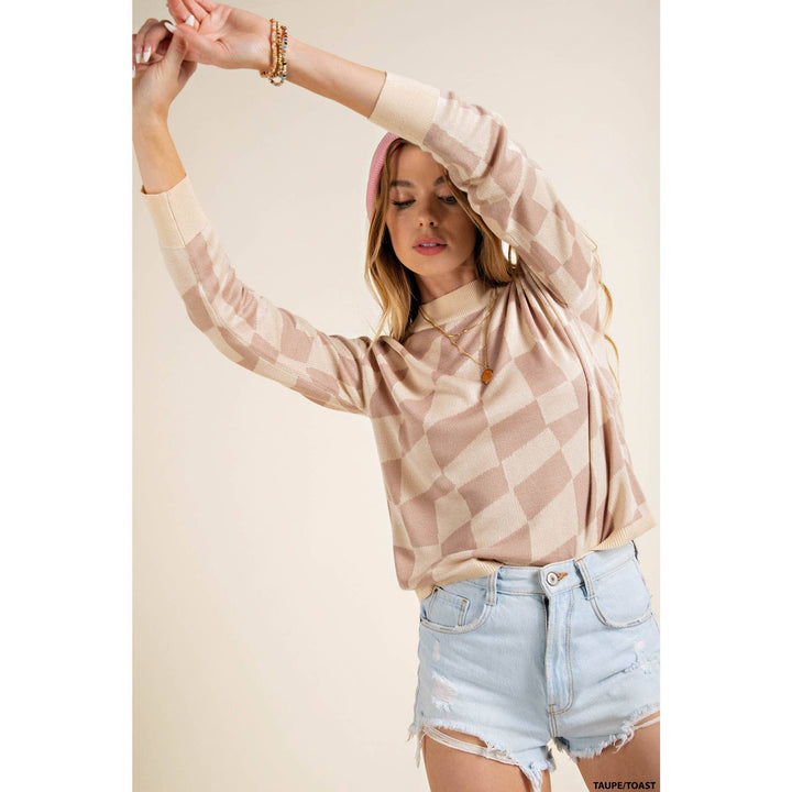 arms up view of Checker print lightweight mock neck knit top featuring soft thread checker knitting and long sleeves.