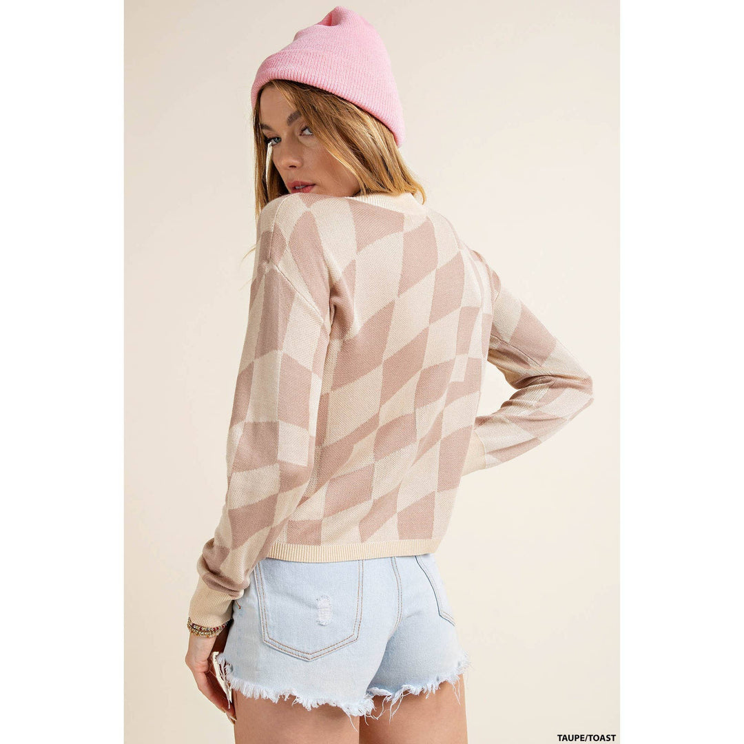 back view of Checker print lightweight mock neck knit top featuring soft thread checker knitting and long sleeves.
