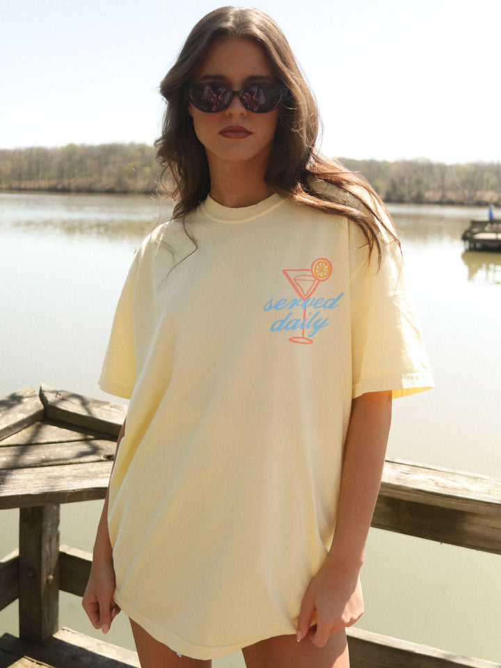 Docktails Tee — butter yellow Comfort Colors® with orange and blue lake-themed front and back graphics, summer-ready by Onyx Native