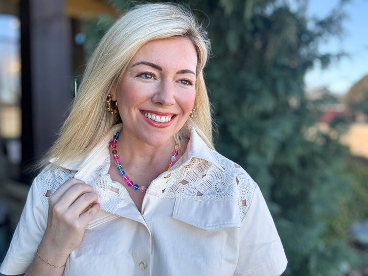 neckline with white Multi-Colored + Clear Beaded Necklace — glass and seed beads with magnetic clasp and gold-plated extender, perfect for layering by Onyx Native