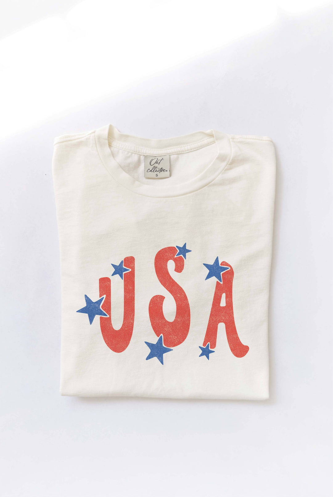 folded USA Star Tee — mineral washed, 100% cotton, relaxed unisex fit, patriotic graphic tee in cream by Onyx Native