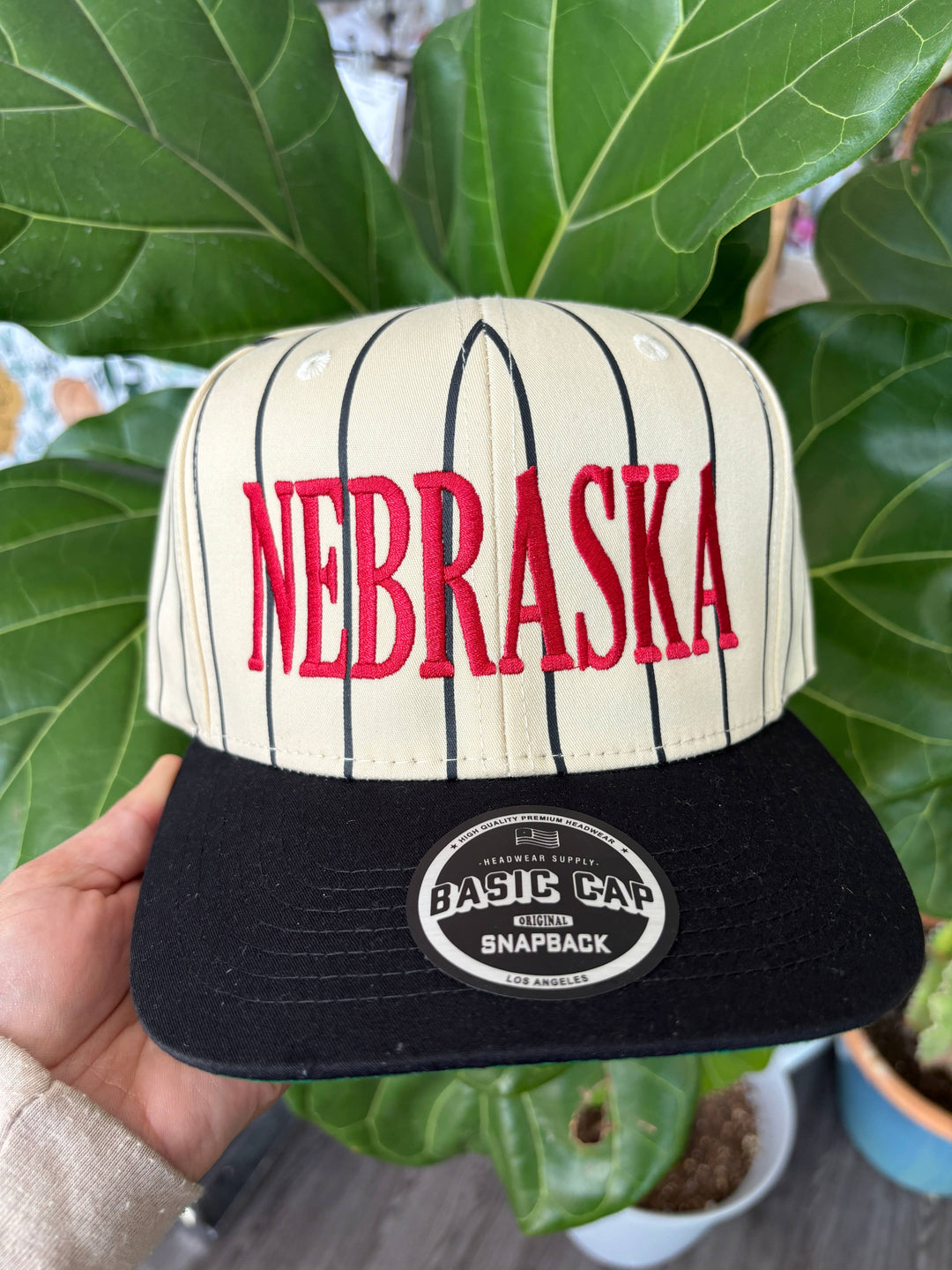 Nebraska Pin Stripe Baseball Cap — embroidered adjustable trucker hat with classic pin stripe design, perfect for casual fans by Onyx Native