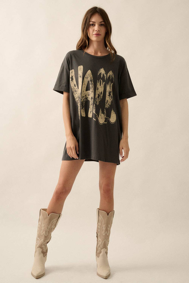 full view of Ya'll Cowboy Boots Vintage Wash Graphic Tee with 'Ya'll' text, stars, and cowboy boots graphics. Oversized fit, mineral washed, round neckline, short cuffed sleeves, and dropped shoulders