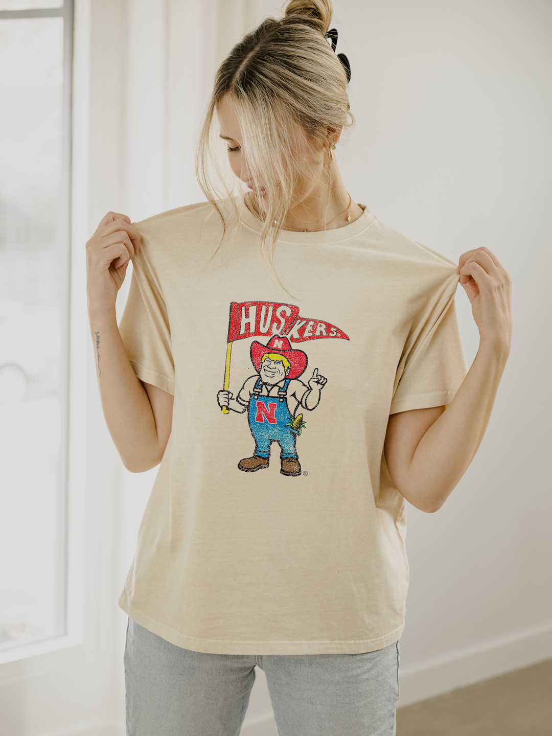 Nebraska Huskers Mascot Flag Game Day Tee - Vintage-inspired 100% preshrunk cotton shirt with unique distressing, unisex fit, officially licensed, pairs well with vintage denim