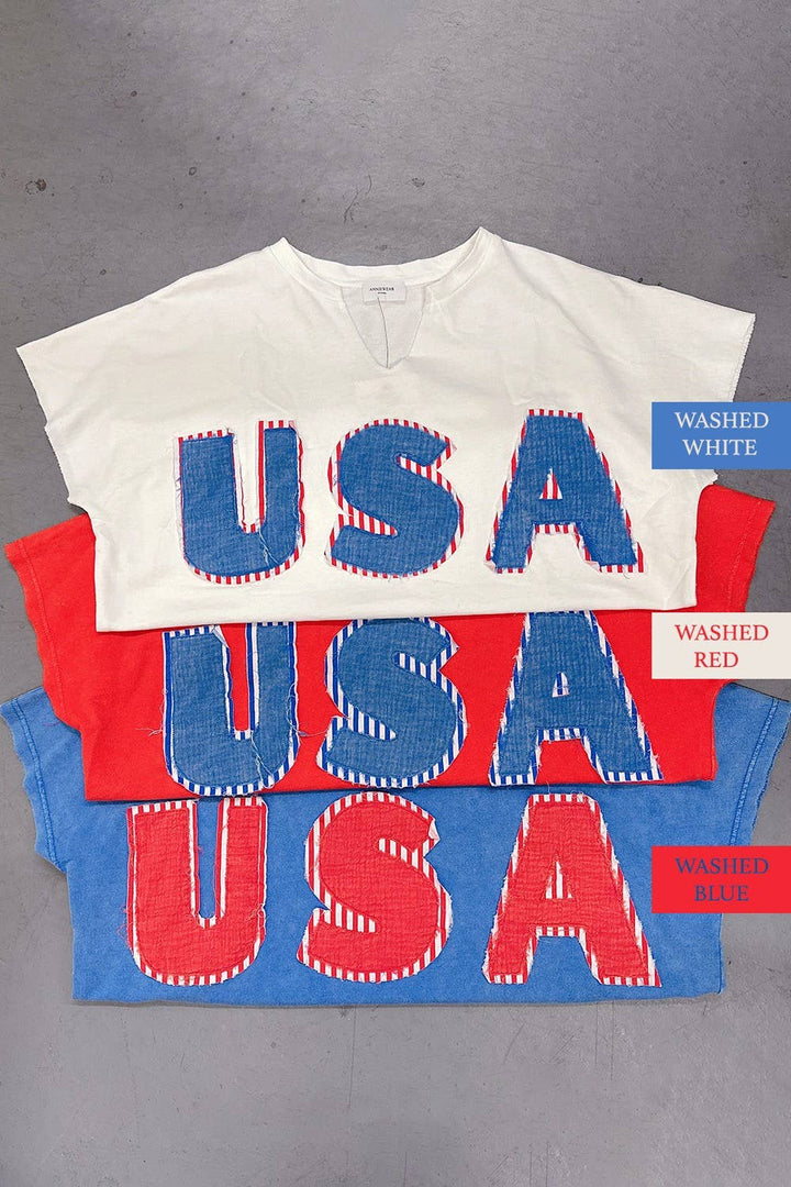 view of all colors of Mineral Washed USA Patched Knit Top with mixed fabric lettering patch, lightweight French terry, notched neckline, short dolman sleeves, raw edge details, and loose fit.
