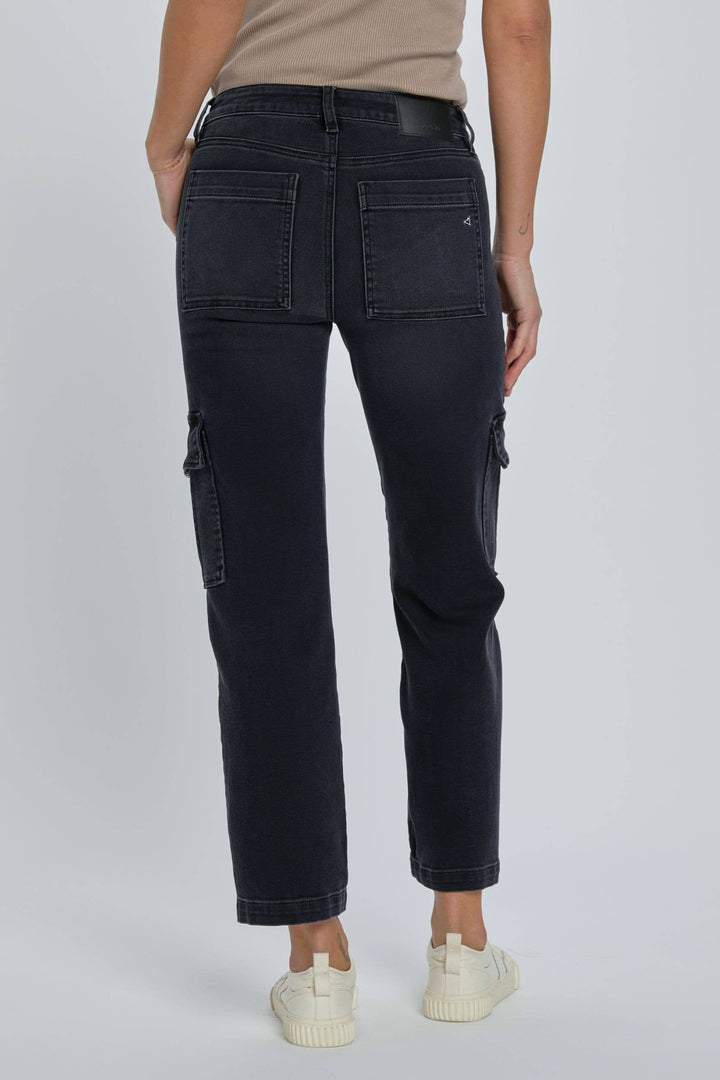 back view of Black stretch cargo pocket straight jeans. Features include a rise of 10 inches and an inseam of 28 inches. Model is wearing size 26. Made of 65% cotton, 21% rayon, 11% polyester, and 2% spandex.
