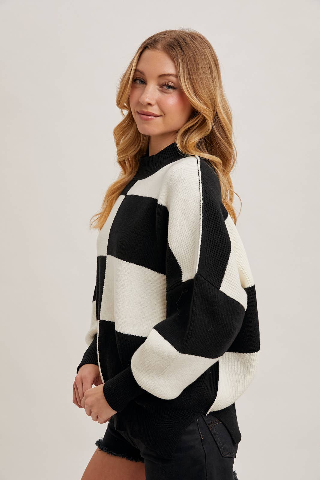 alternate view of Black Color Block Sweater with dolman sleeves, soft knit fabric, and a stylish design, perfect for versatile styling, available at Onyx Native.