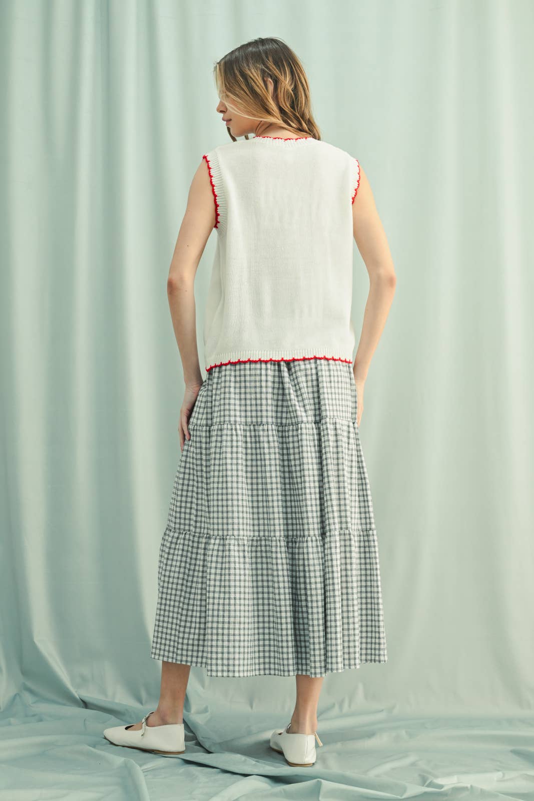 back view Scalloped Button-Up Sweater Vest — sleeveless, lightweight layering piece with functional buttons by Onyx Native

