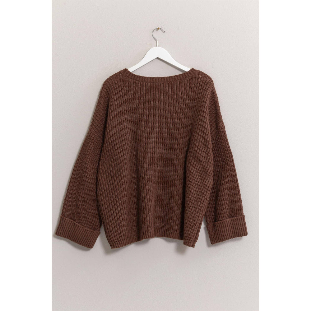 back view of Allie Oversized Pullover Sweater with all-over ribbing, round neck, and patch pocket.