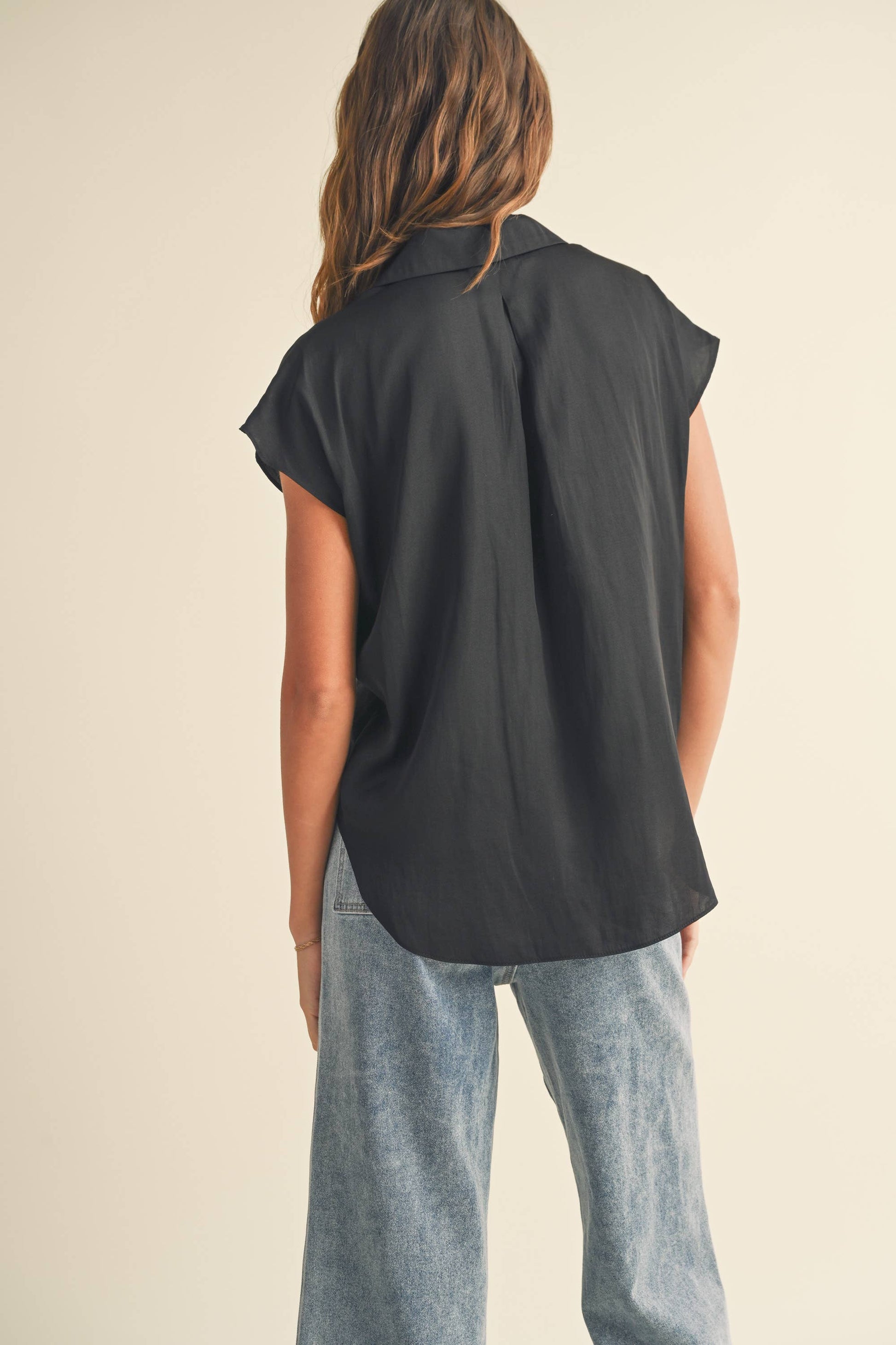 back view of Button-down cap sleeve shirt in a light and breathable fabric.