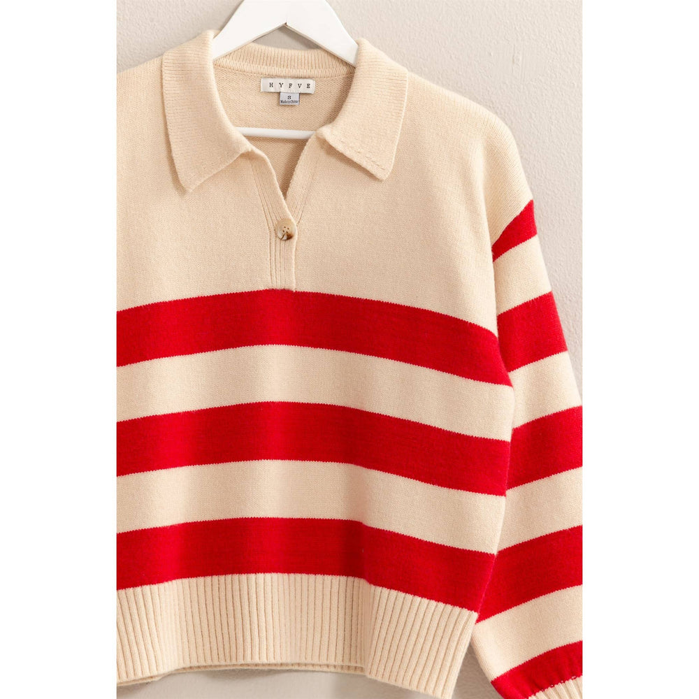 close up detail of red colored That’s So 70’s Collared Stripe Sweater with bold horizontal stripes and a relaxed fit, featuring a classic collar with a single button, available at Onyx Native.