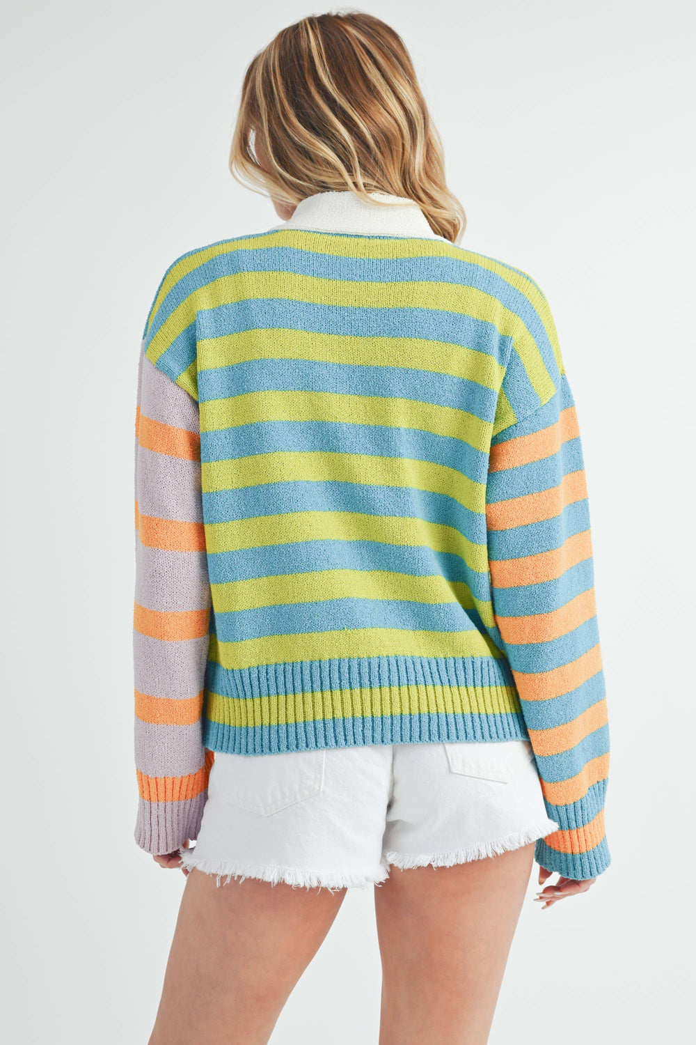 back view of Flavia Sweater featuring mixed stripes, drop-shoulder design, cashmere-blend fabric, deep V-neck, and front button closure.