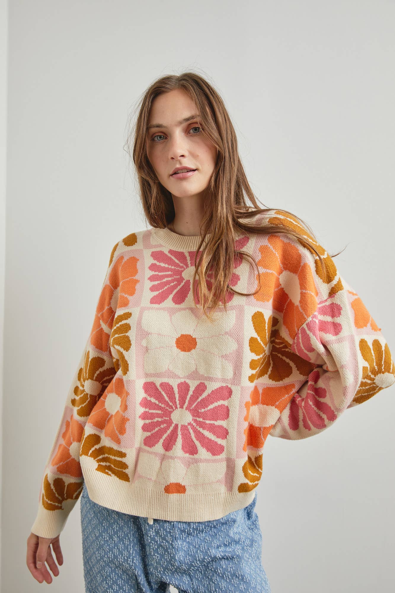 Floral Intarsia Knit Sweater with long sleeves and round neck, true to size fit, available at Onyx Native.