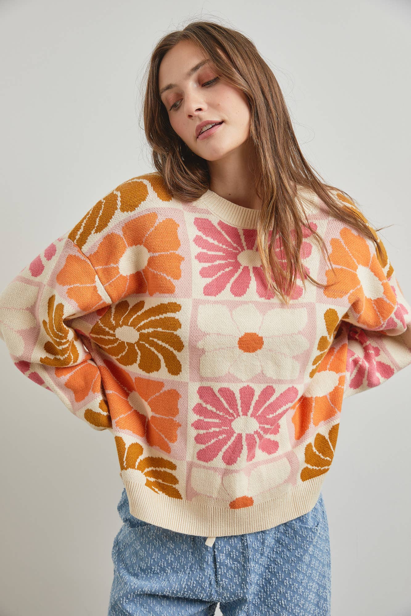 Floral Intarsia Knit Sweater with long sleeves and round neck, true to size fit, available at Onyx Native.