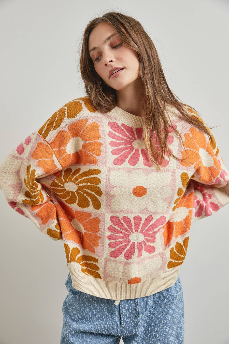 Floral Intarsia Knit Sweater with long sleeves and round neck, true to size fit, available at Onyx Native.