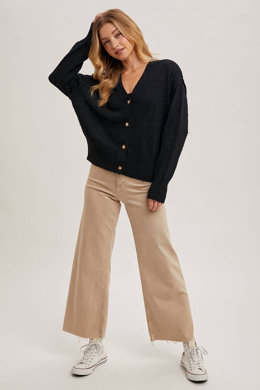 zoomed out view of Black Betty Button-Down Cardigan with a classic button front, relaxed fit, and long sleeves, made from soft knit fabric for cozy layering, available at Onyx Native.