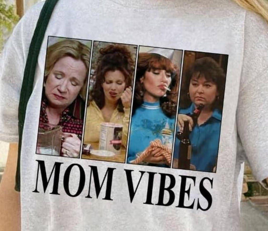 Mom Vibes Sweatshirt in heather grey, printed on a Gildan crew. Perfect for 90’s kids turned parents, with a recommendation to size up for a looser fit