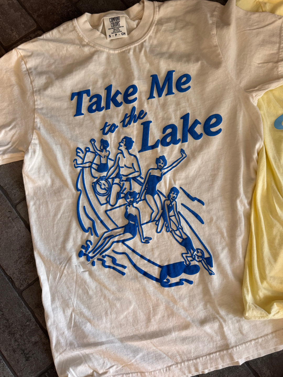 close view Take Me to the Lake Tee — cream Comfort Colors® tee with vintage blue lake graphic, Jo Johnson Overby collaboration by Onyx Native

