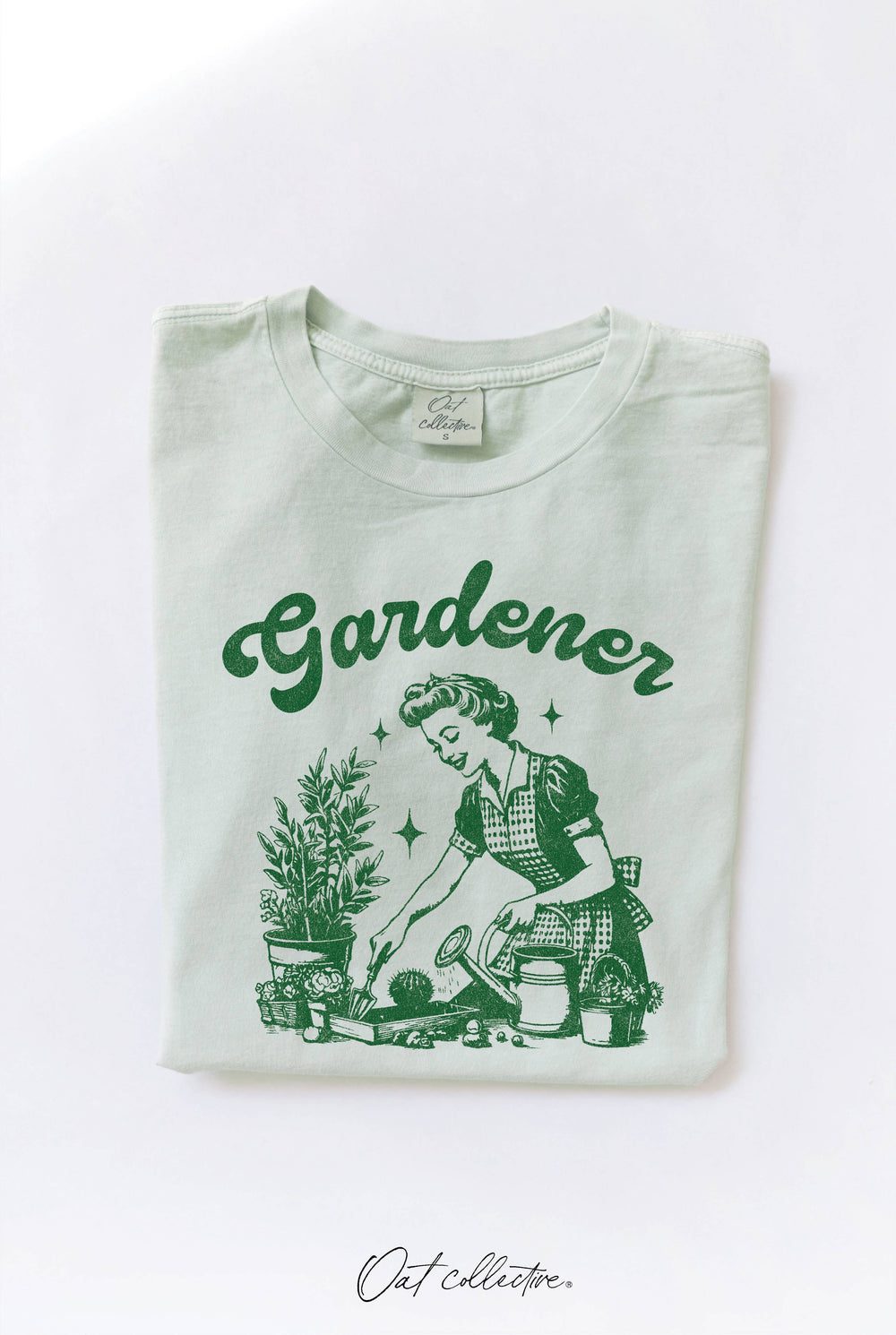 graphic view of GARDENER Mineral Washed Graphic Top, 100% premium cotton jersey, relaxed unisex fit, screen-printed with water-based ink, exclusive Oat Collective label.
