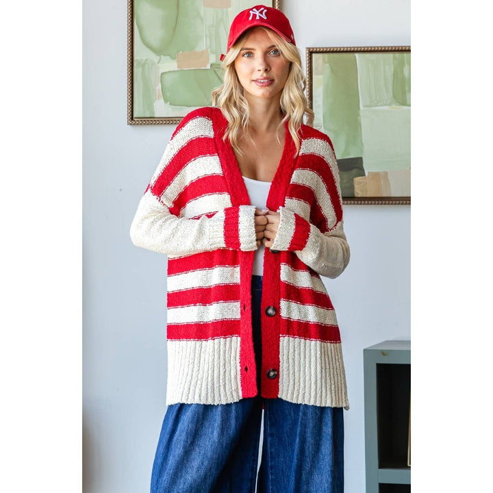 slight open front detail of Sally Stripe Mix Oversize Cardigan with 3-button front, solid stripe accents, and side slit design, available at Onyx Native.
