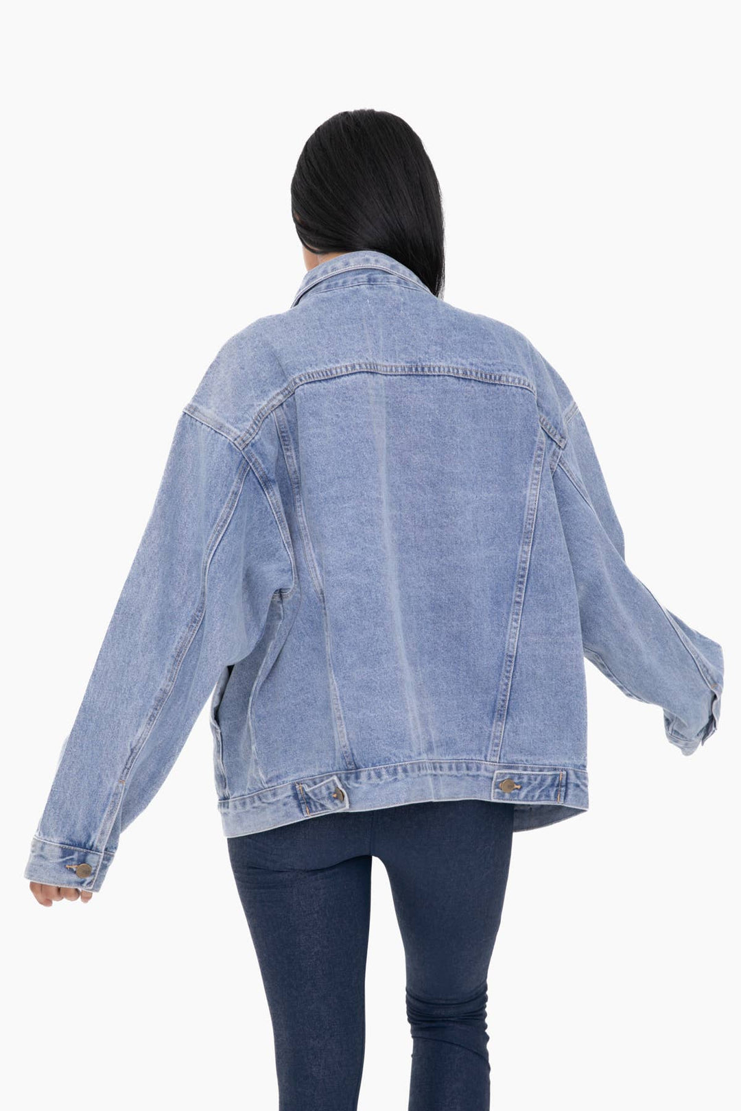 back view of. Roxy Boxy-Cut Denim Jacket in 100% cotton, oversized fit with breast and side pockets, available at Onyx Native.
