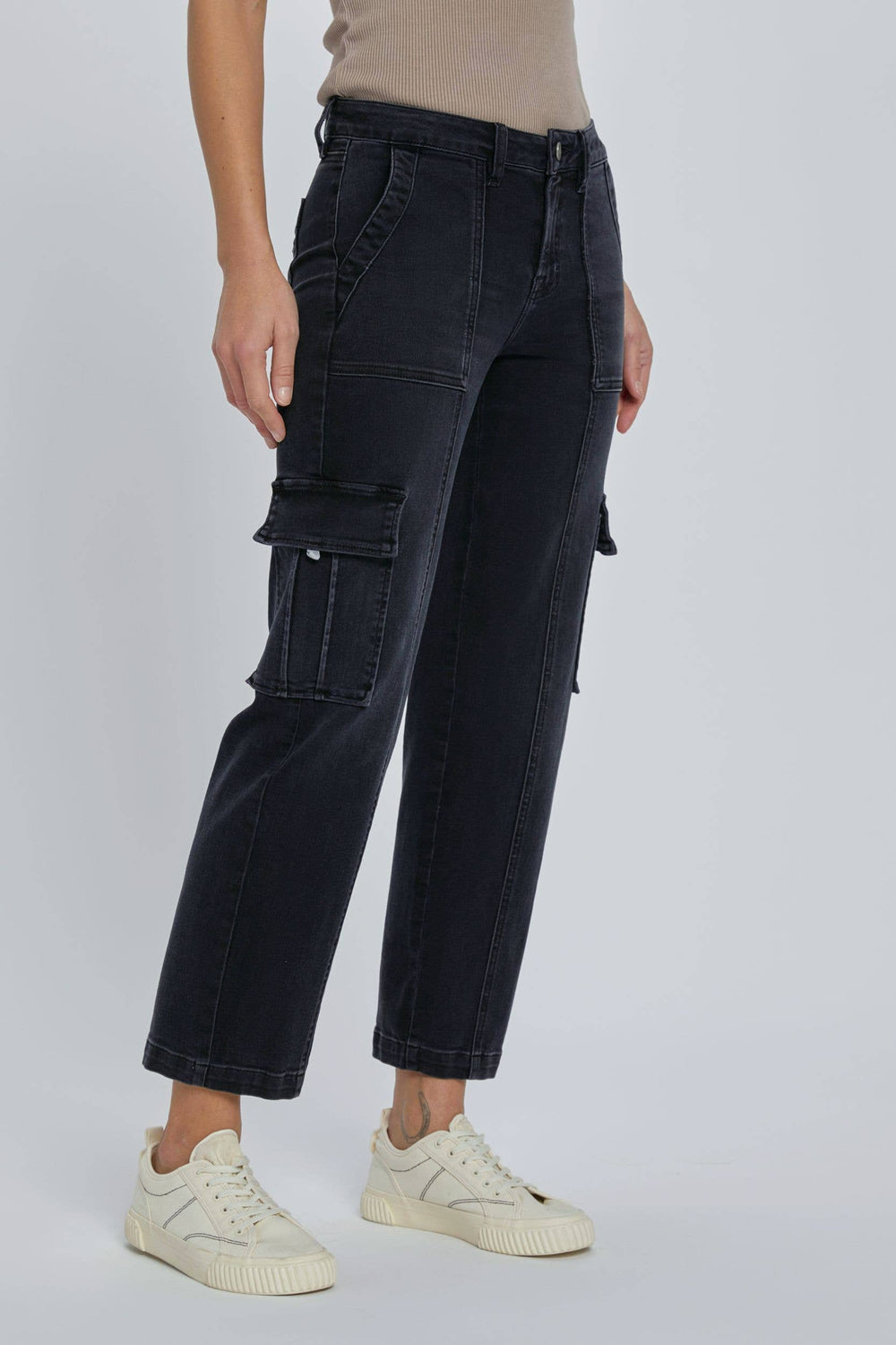 slight side view of Black stretch cargo pocket straight jeans. Features include a rise of 10 inches and an inseam of 28 inches. Model is wearing size 26. Made of 65% cotton, 21% rayon, 11% polyester, and 2% spandex.