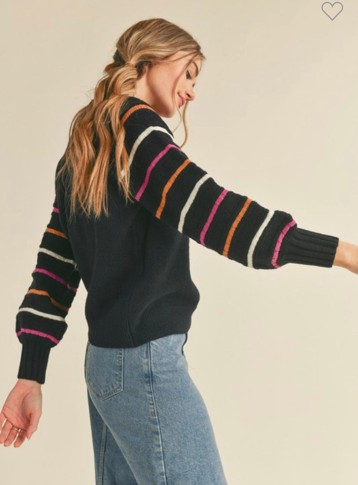 back view of Relaxed fit pullover with ribbed neck, sleeve, and waist details. Features balloon sleeves for added style.