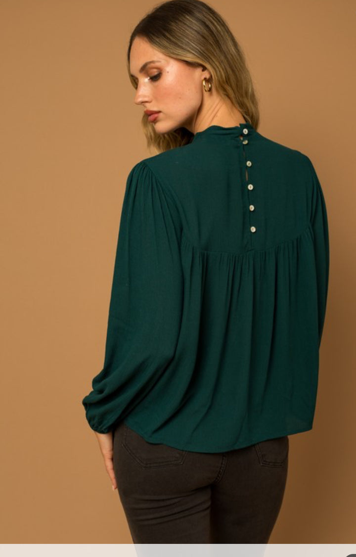 back detail of Women's long sleeve top with mock neck and button back detail, true to size fit, available at Onyx Native.