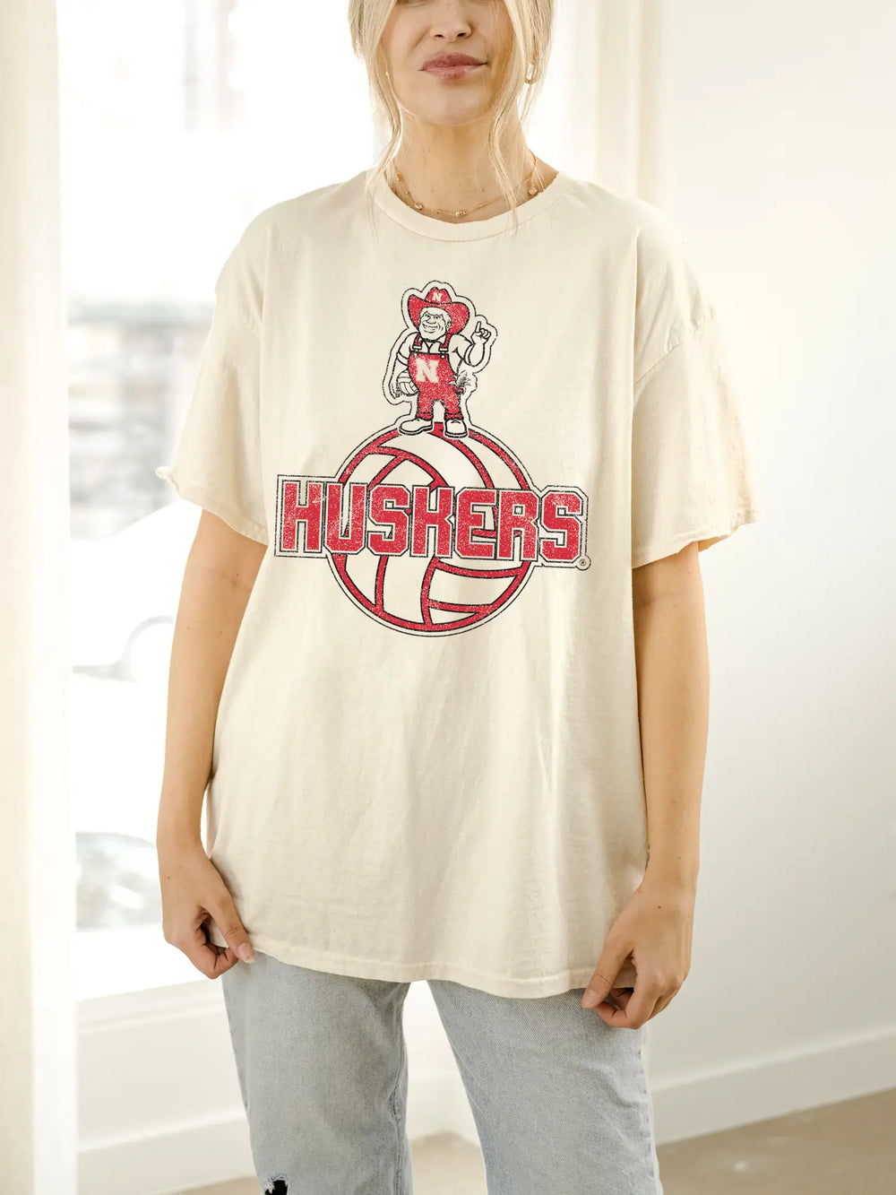 Vintage-inspired University of Nebraska Corn Huskers graphic tee with distressed details.