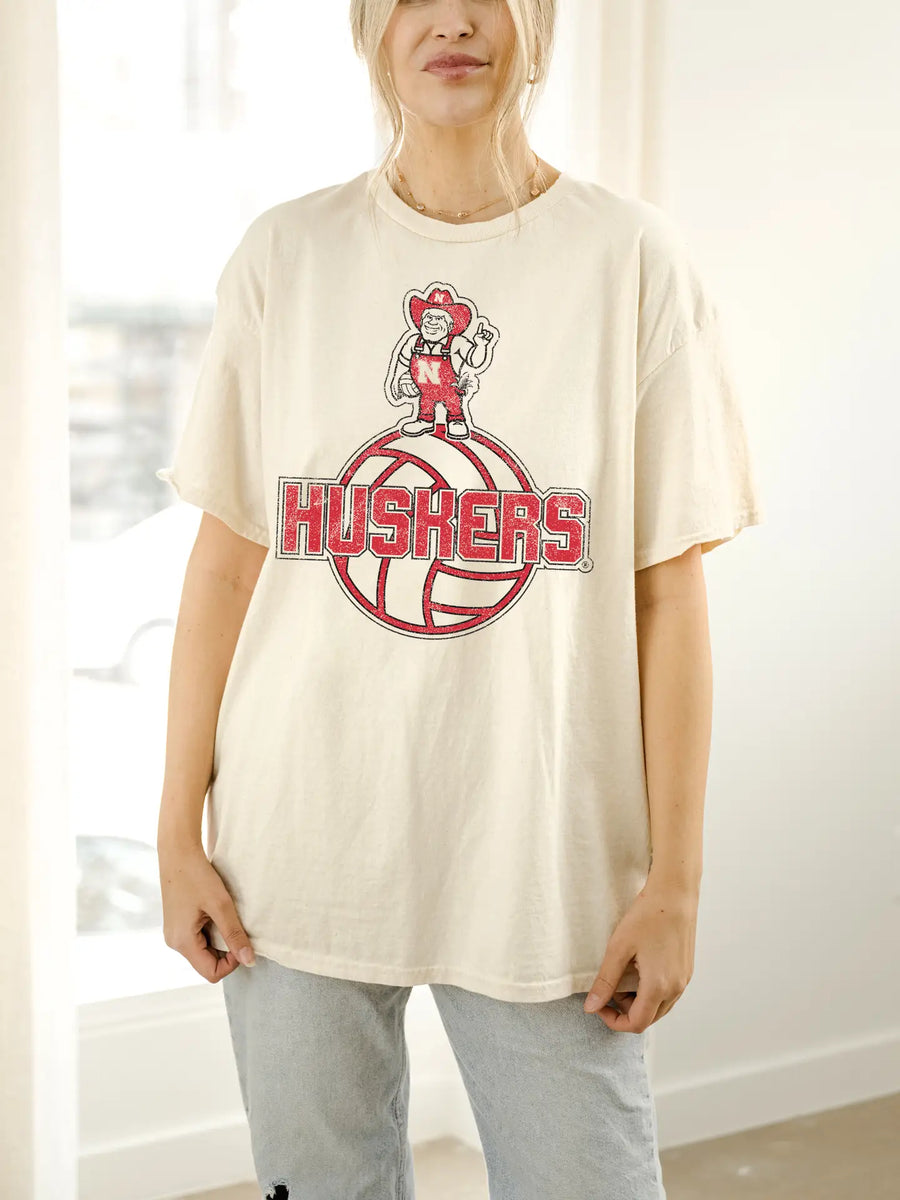 Vintage-inspired University of Nebraska Corn Huskers graphic tee with distressed details.