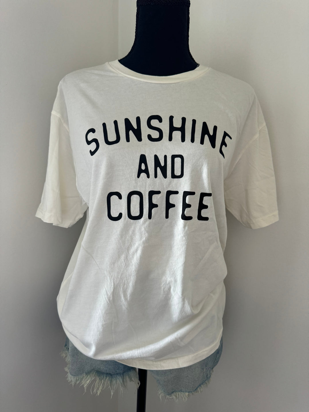 mannequin view of SUNSHINE AND COFFEE Graphic Top, 100% cotton, mineral washed, relaxed unisex fit, water-based screen print, exclusive Oat Collective label.